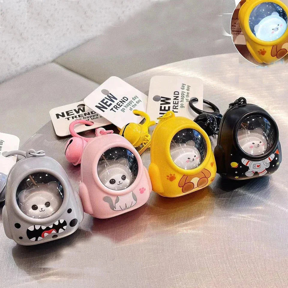 Llaveros SHX diseño astronauta con caras de animales, colores gris, rosa, amarillo y negro, trend original