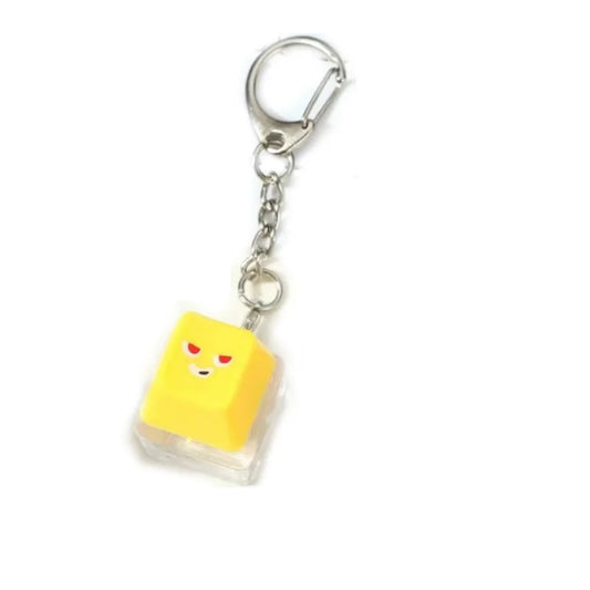 Llavero teclado antiestrés amarillo