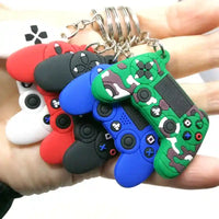 Llaveros gamer en forma de control de videojuego en colores camuflaje, azul, negro, rojo y blanco, diseño divertido y creativo