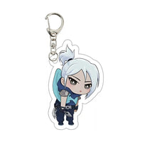 Llavero gamer de personaje anime con cabello blanco y fondo transparente, ideal para mochilas.