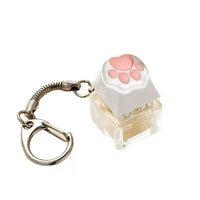 Keychain with a translucent square base and white keycap featuring a pink cat paw design